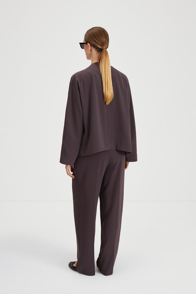 Barrea jacket short crepe one piece collar stand at back dropped shoulders brown stylein back image