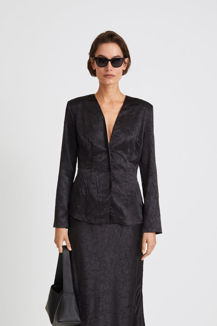 Monopoli top creased satin long sleeves form fitting v neck shoulder pads button black stylein front close image