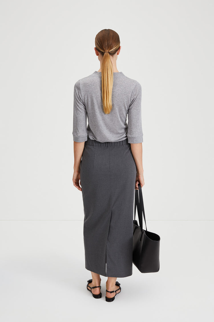 stylein minimalistic scandinavian timeless swedish design womenswear classics classic grey striped maxi skirt berkeley model backside