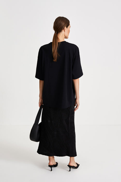 Inga skirt light maxi crushed plisse bias cut shiny black stylein back image