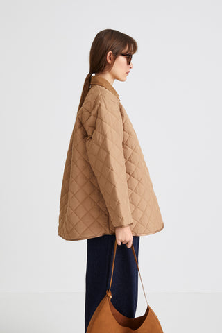 Hanna jacket voluminous quilted padding yoke and box pleats wide sleeves corduroy collar beige stylein side image