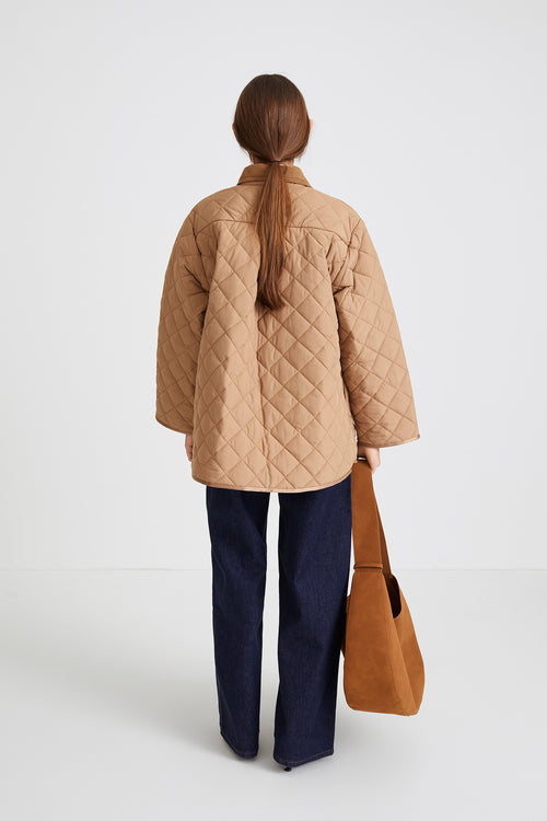 Hanna jacket voluminous quilted padding yoke and box pleats wide sleeves corduroy collar beige stylein back image