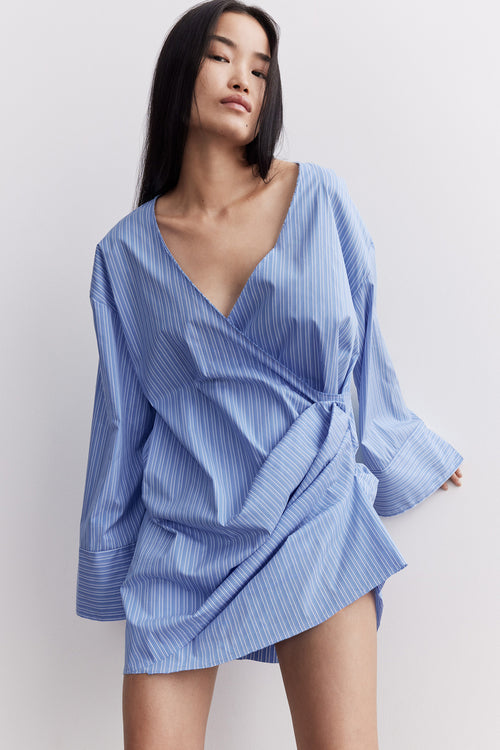 Jordana shirt dress voluminous asymmetrical v neck pleats wide cuff blue stripe stylein front image