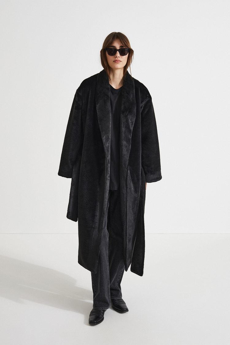 Hermina coat faux fur one piece shawl collar full length sleeves belted waits black stylein front image