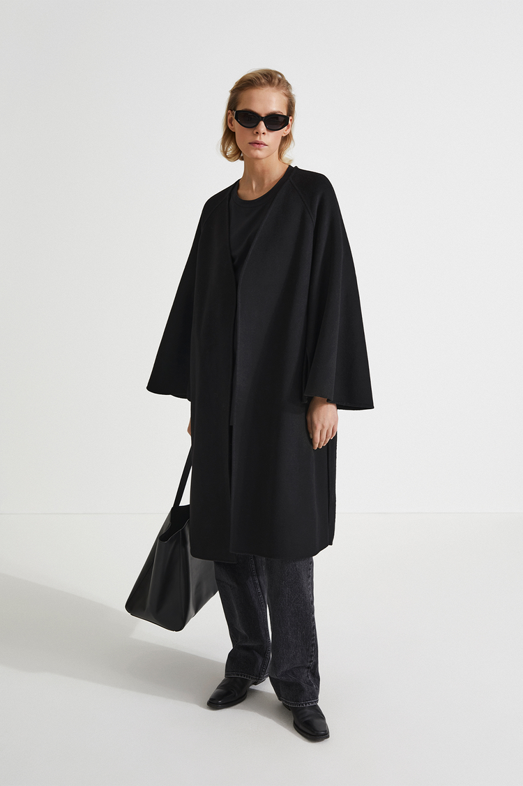 Trento coat long kimono inspired dropped shoulders flared full length sleeves attached belt wool mix black stylein front image