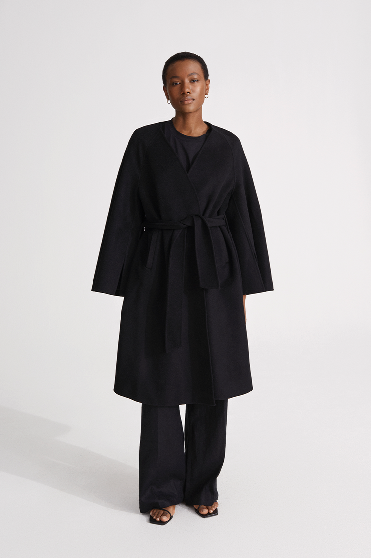 Trento coat long kimono inspired dropped shoulders flared full length sleeves attached belt wool mix black stylein front image 