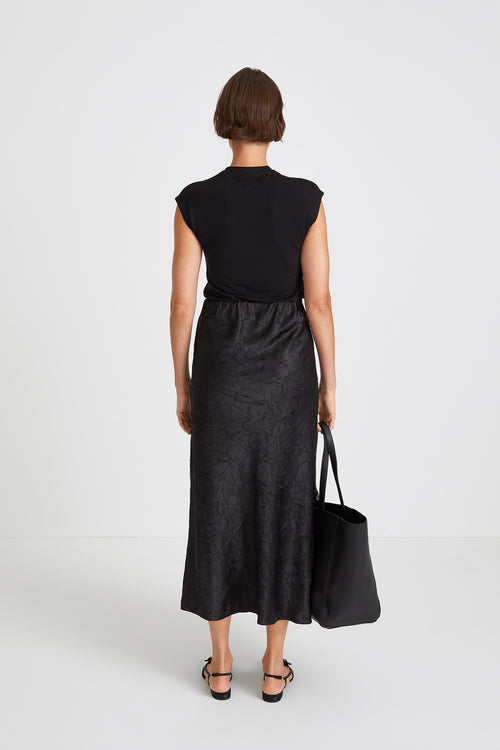 Mabel skirt creased satin ankle length flattering drape bias cut black stylein back image