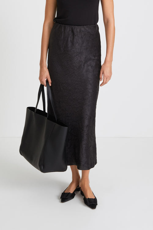 Mabel skirt creased satin ankle length flattering drape bias cut black stylein front image