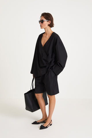 Johnny shirt voluminous v neckline overlapping front panels plates wide cuffs long sleeves black stylein side image