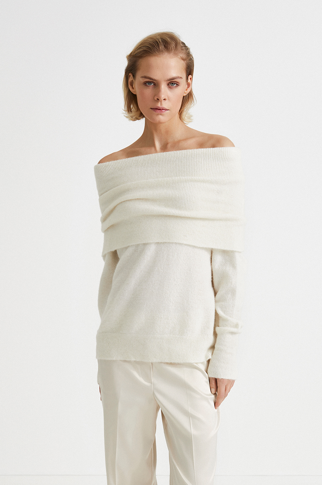 White over deals the shoulder sweater
