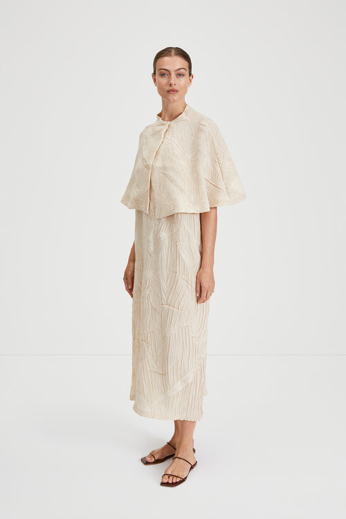 Ida cape crushed plisse fabric built up neckline darts front and back sand stylein side image