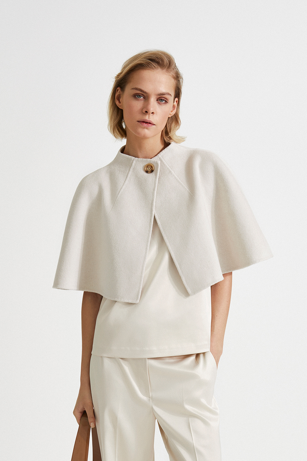 Cream sales cape jacket