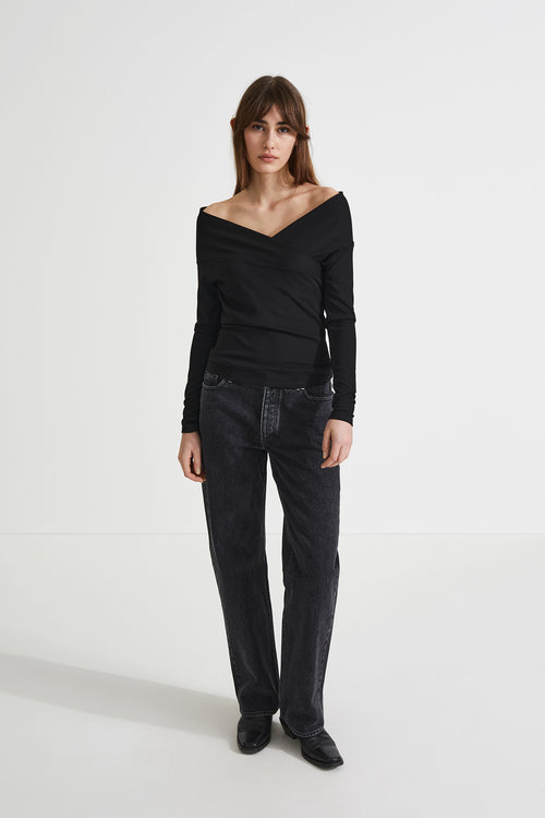 Debora top long off the shoulder fitted full length sleeves overlapping front piece  jersey black stylein front image