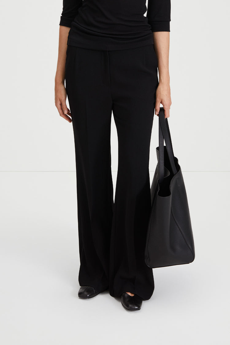 Beline trousers kick flared design crepe full length crease lines at front and back black stylein front close image