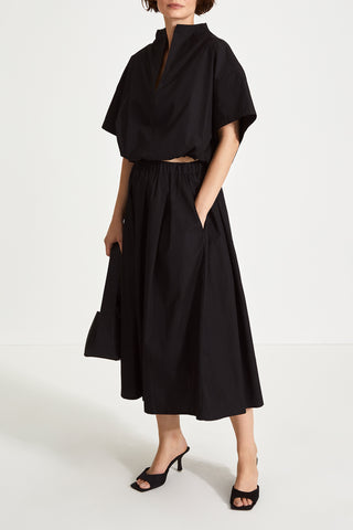 Jilly shirt voluminous vneck subtle high neck short wide sleeves gathered bottom hem black stylein side image