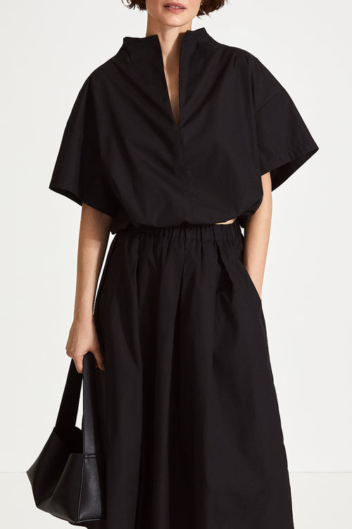 Jilly shirt voluminous vneck subtle high neck short wide sleeves gathered bottom hem black stylein front image