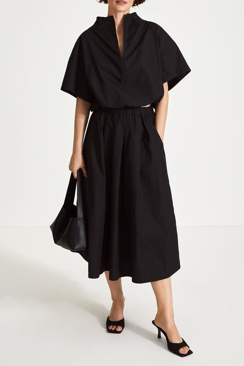 Jilly shirt voluminous vneck subtle high neck short wide sleeves gathered bottom hem black stylein front image