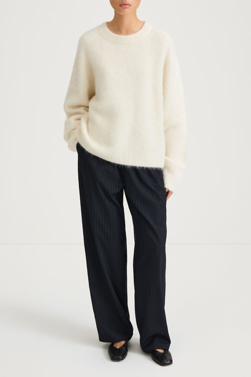 white alpacka knitted sweater stylein lorena model image