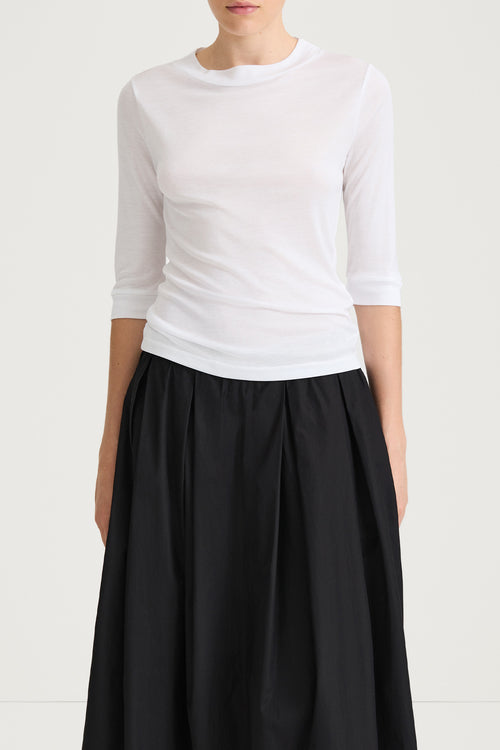 white shortsleeve top stylein nogara close up