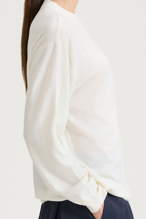White sweater crew neck stylein hera side close up model image