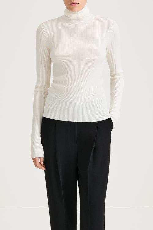 white turtleneck knitted sweater stylein helea close up