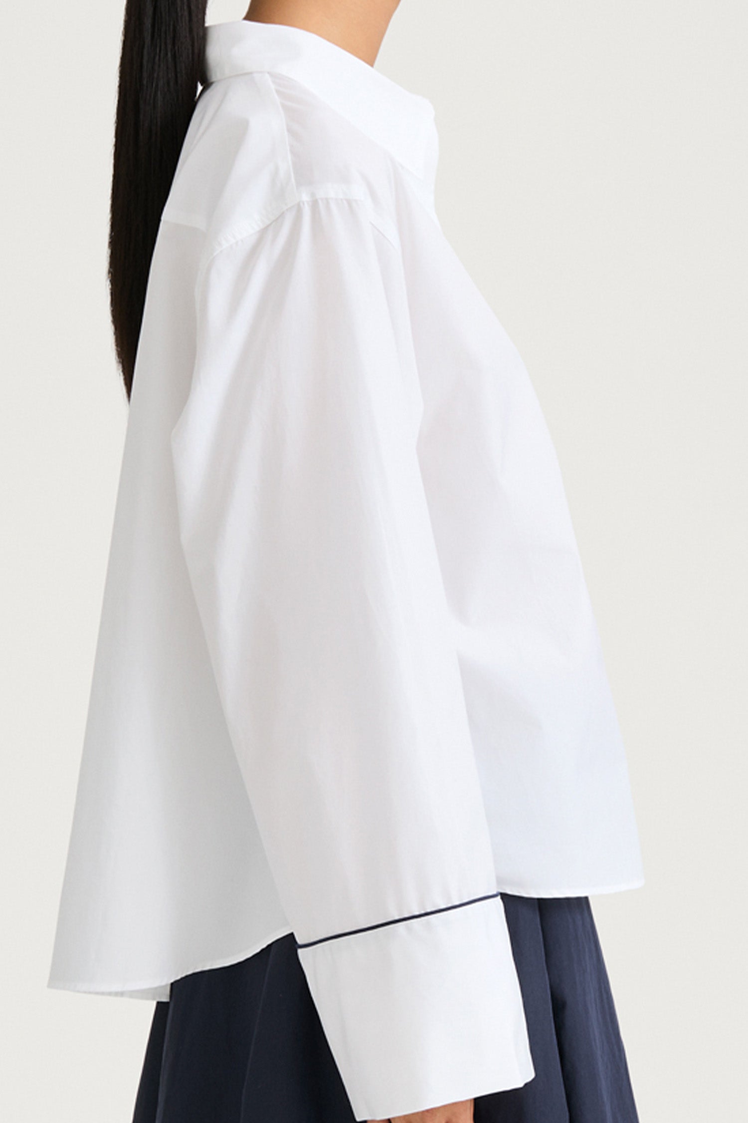 White wide sleeve shirt stylein jovanna side close up model image