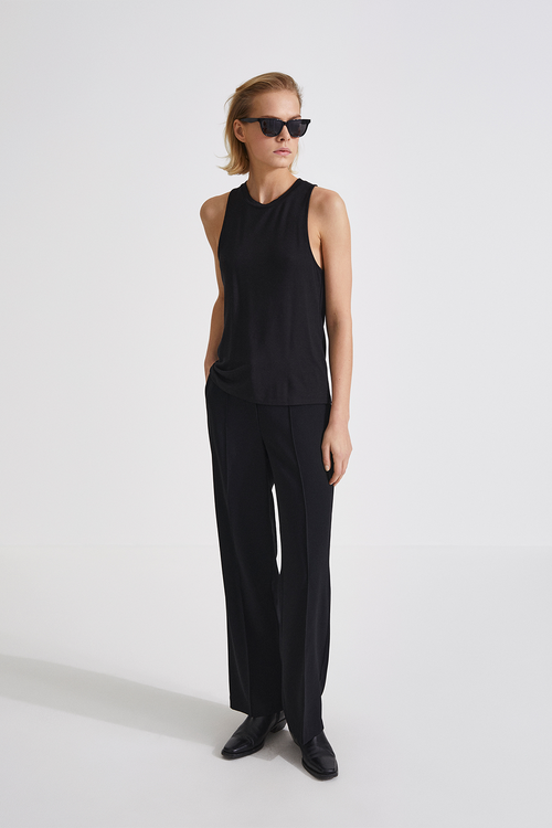 Boris loose fitted trousers sewn creases black stylein front image