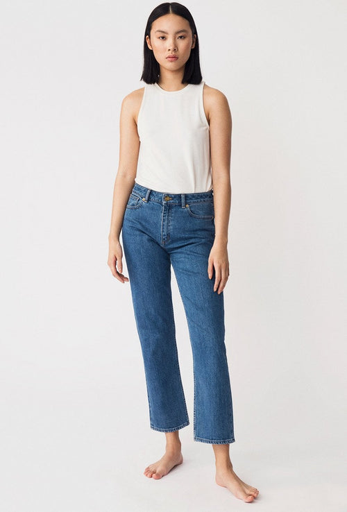 Kasey is a pair of classic straight fitted denim jeans with cropped length and mid-waist made in a more sustainable BCI cotton.
