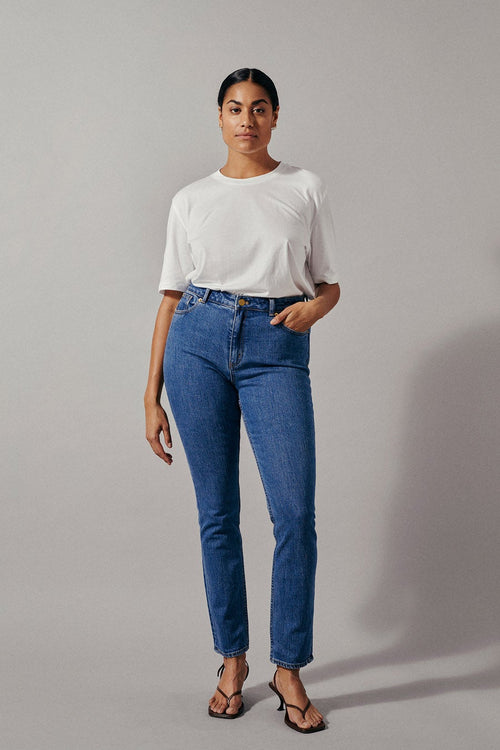 Katie is a pair of high waisted denim jeans with a slim fit and full length legs. They are true to size and made from a sustainable BCI cotton.