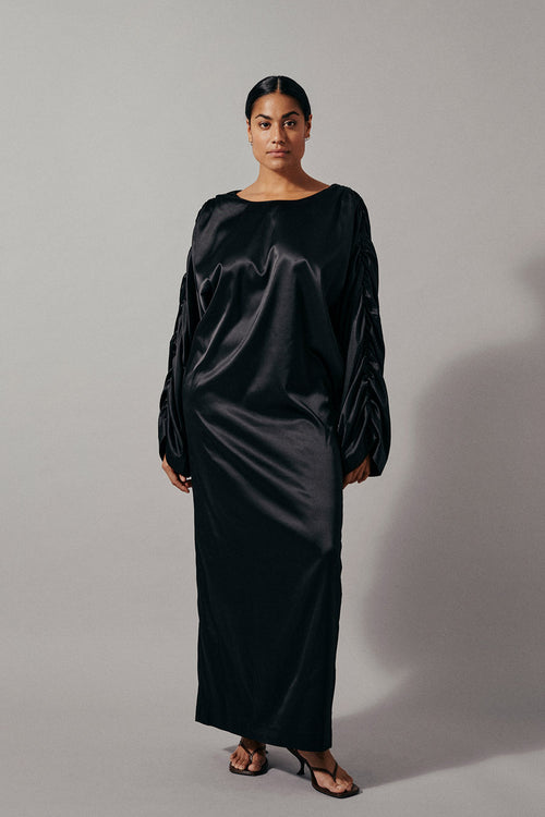 Maia dress maxi wide full length sleeves gathering detail shoulder seams rounded neckline belt waist black stylein front image