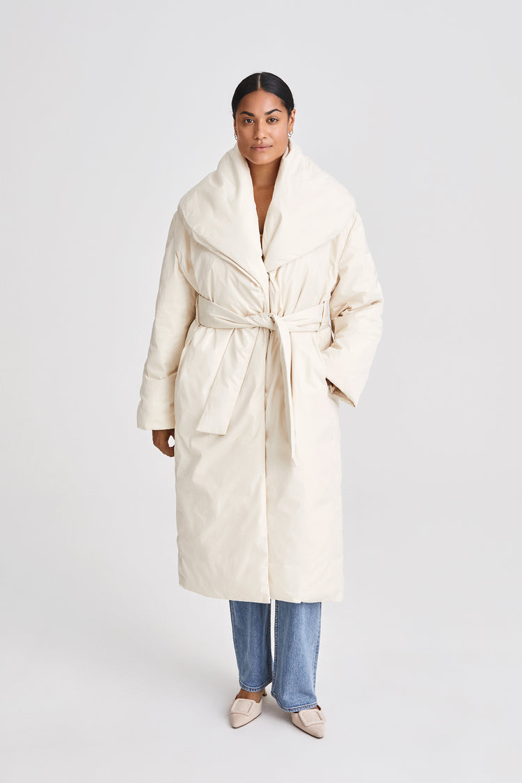 Habo coat padded calf length one piece shawl collar voluminous belted cream stylein front image