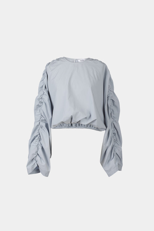 Jennifer top cotton wide long sleeves gathering detail at shoulder seems cropped elastic bottom hem rounded neckline key hole back steel blue stylein packshot