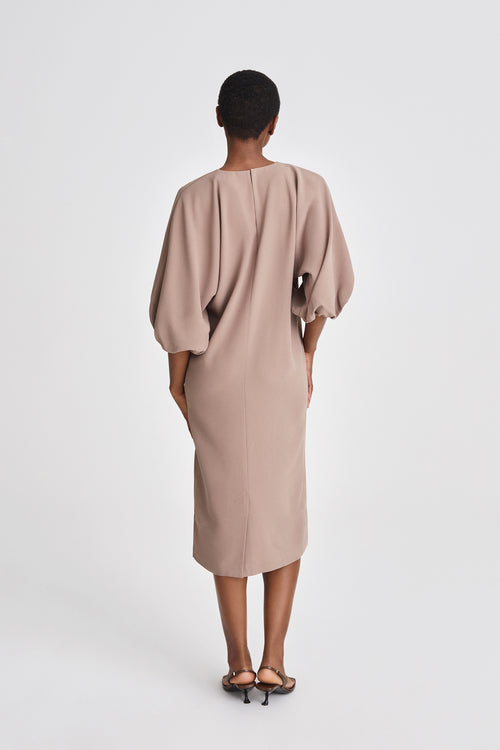 Brunate dress calf length loose fit body rounded neckline voluminous sleeves nougat stylein back image