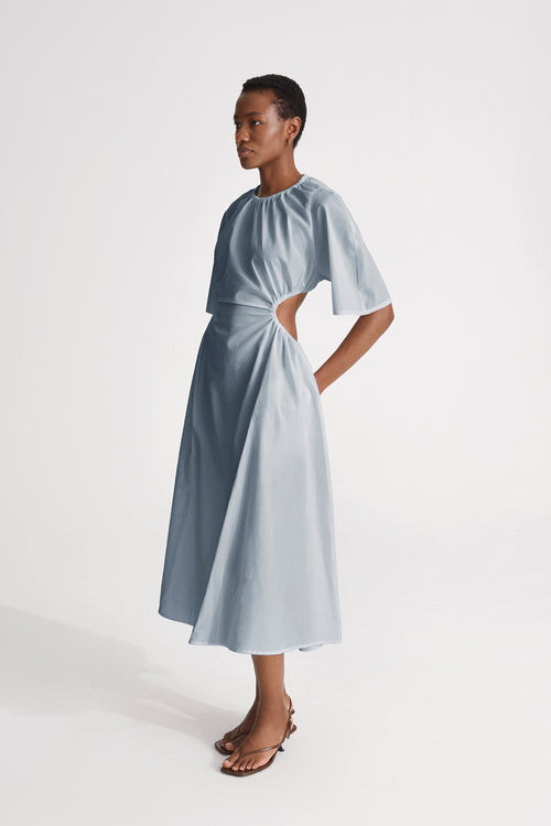 Jarama dress flared open back cotton midi gathered cuts elbow long sleeves pockets steel blue stylein side image