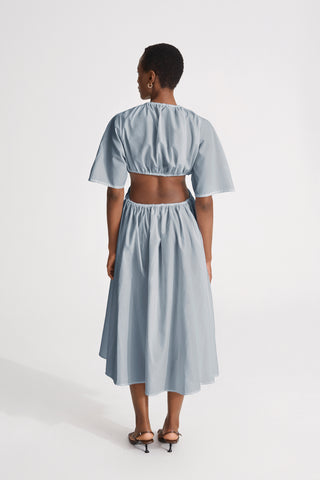 Jarama dress flared open back cotton midi gathered cuts elbow long sleeves pockets steel blue stylein back image