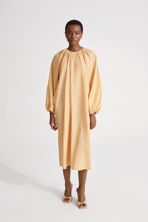 Jasmine dress seersucker midi voluminous full length sleeves rounded neckline keyhole back yellow stylein front image