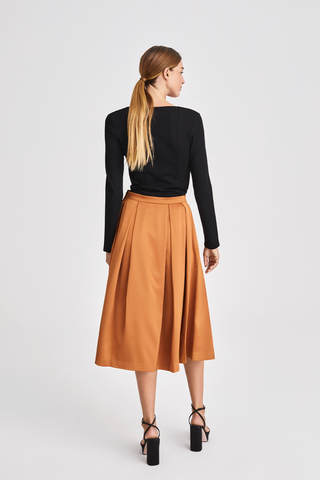 Moje skirt calf length box pleats a line dark ginger burnt orange stylein back image 