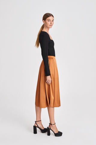 Moje skirt calf length box pleats a line dark ginger burnt orange stylein side image